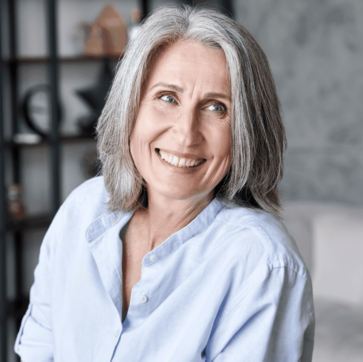 Elderly woman smiling after root canal treatment