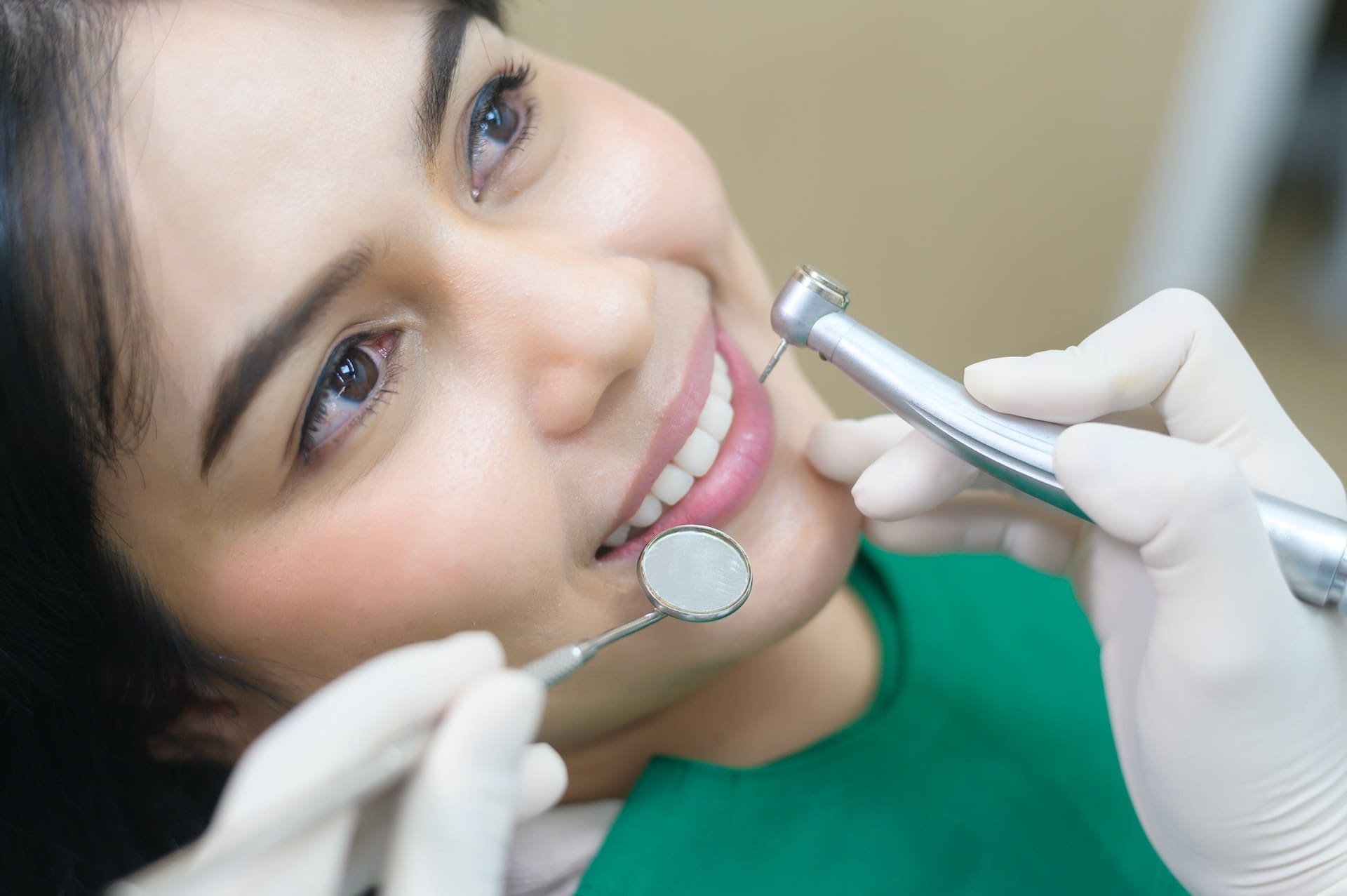 Woman receiving dental cleaning