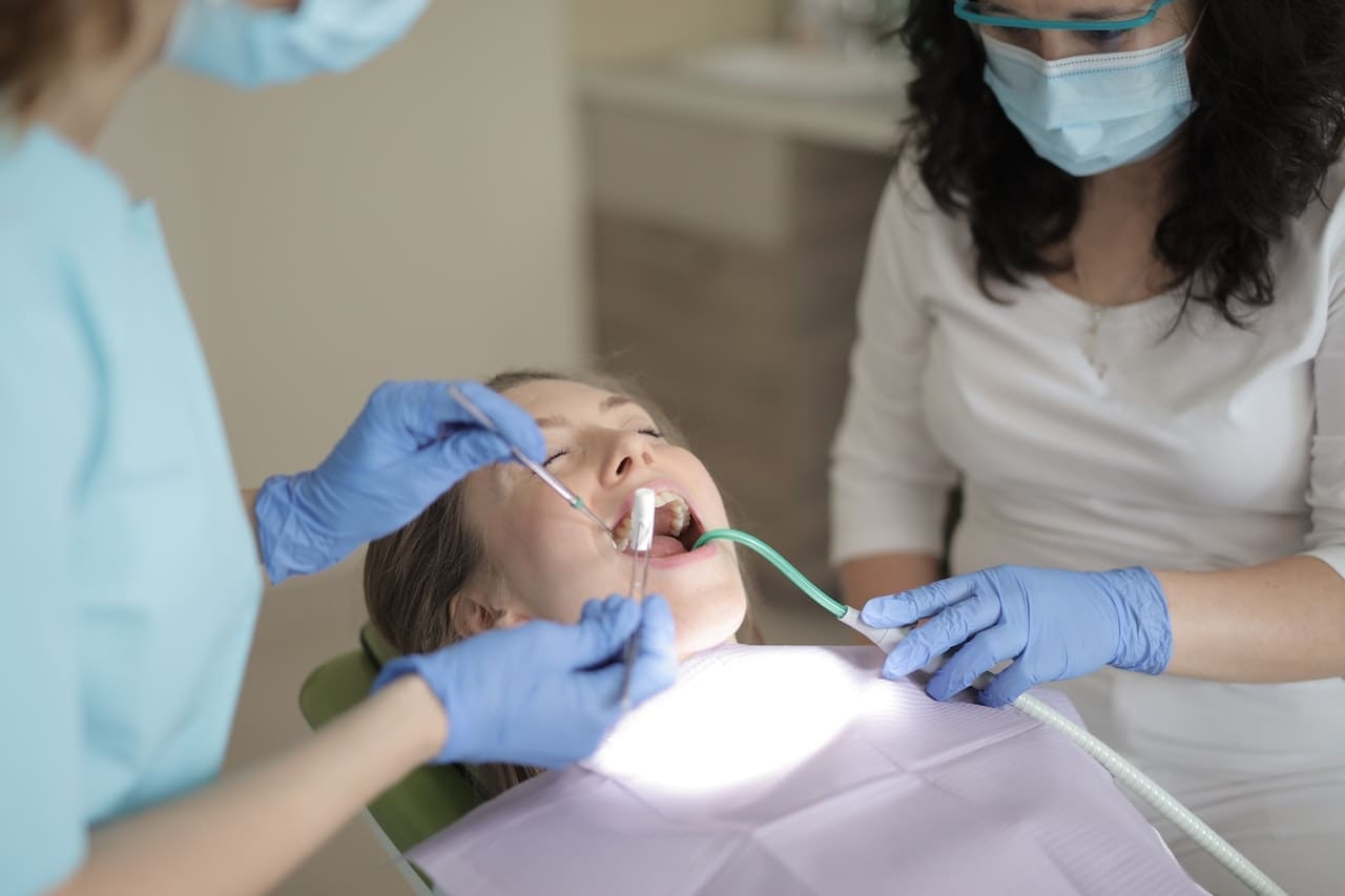 Patient receiving dental bonding treatment