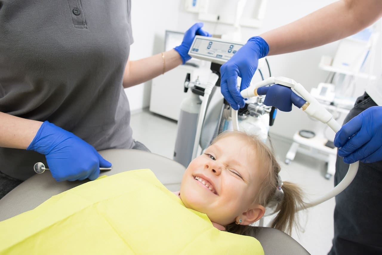 Child receiving pediatric dentistry