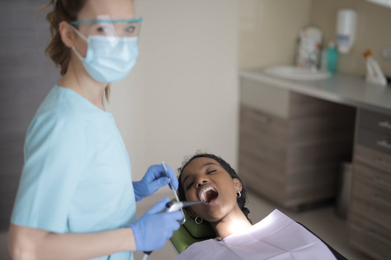 Patient receiving dental veneers